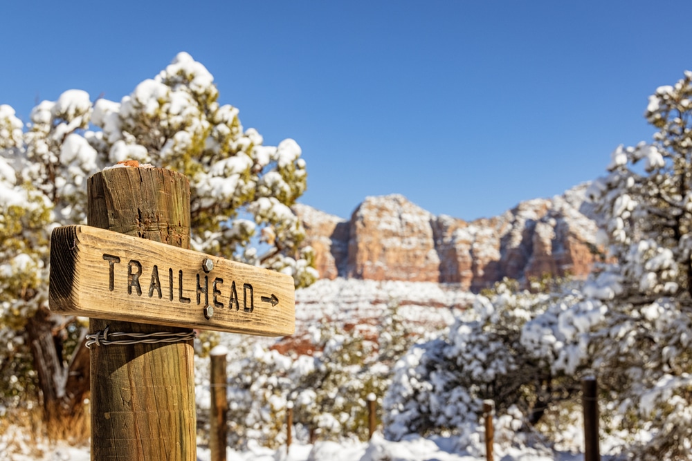 For adventurous couples, a romantic getaway in New Mexico may include winter hiking like this snow dusted trail in the mountains.